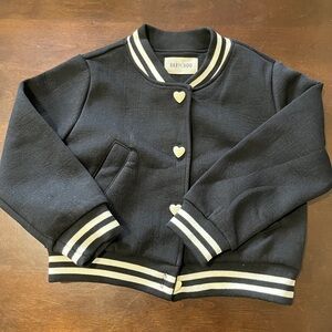 Black jacket with heart buttons